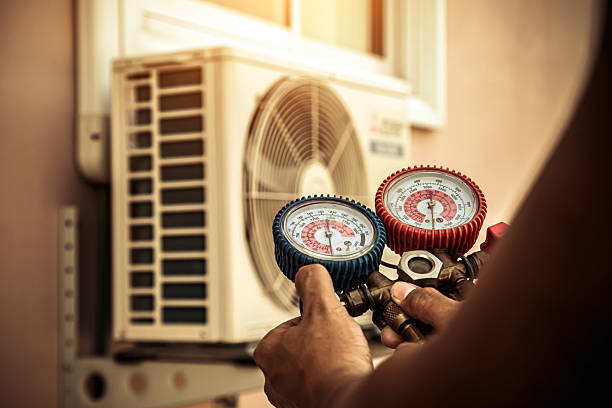 Professional Ductwork Repair technician working in Newton, MA